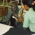 на фабрике по производству джинсовой одежды
